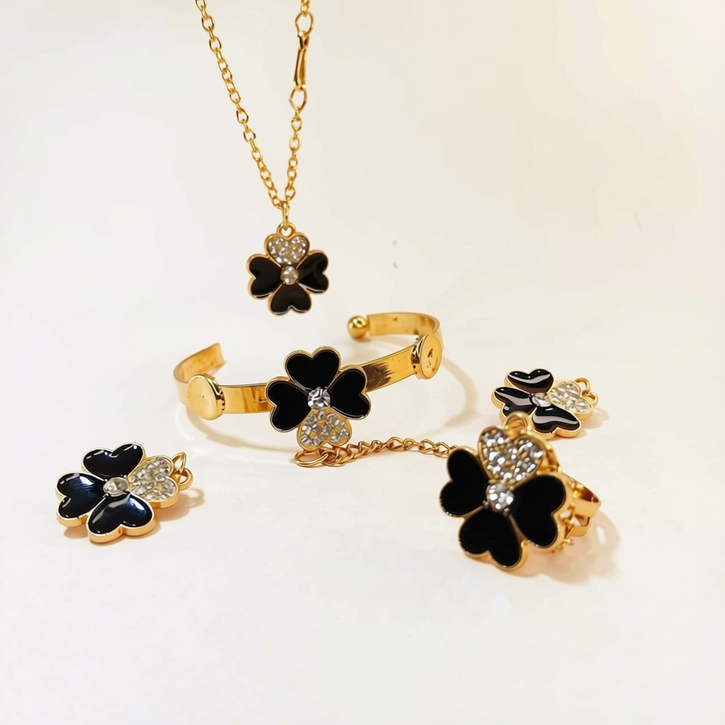 Black Clover Artificial Jewelry Set for Women – Necklace, Bracelet & Earrings